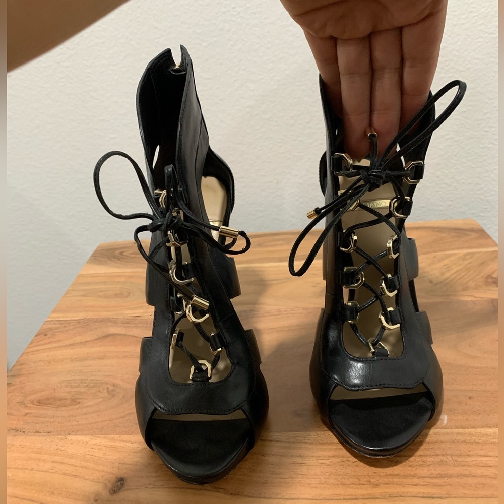 Black leather Marciano heels.